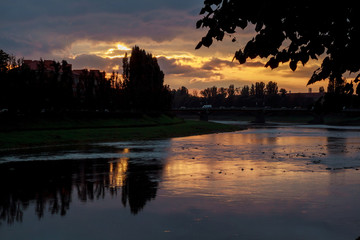 Obraz premium sunset over the river