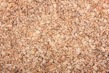 Brown cork board background.