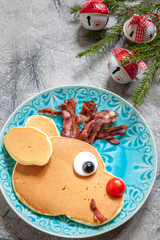 Christmas food for kid. Rudolph reindeer pancake