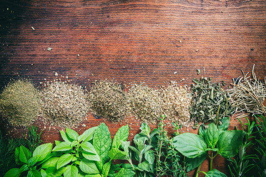 Herbs on a wooden surface