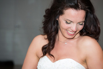 girl smiling with the wedding dress