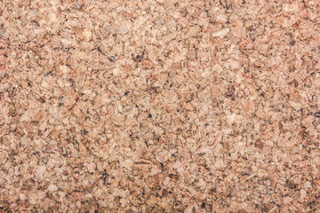 Brown cork board background.