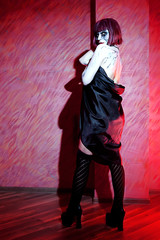 Fototapeta premium girl with zombie make up in black dress