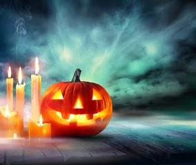 Foto op Plexiglas Halloween - Pumpkin With Candles In The Mist Night    © Romolo Tavani
