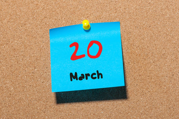March 20th. Day 20 of month, calendar on cork notice board background. Spring time, empty space for...