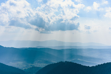 Carpathian Mountains in Summer. Gorgeous blue sky with big clouds over the Carpathian Mountains