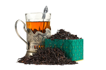 dry tea leaves  and glass