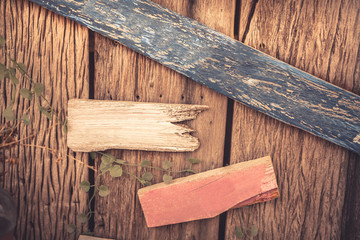 Wooden textured background as old cracked wooden fence with blank wooden directional signs with copy space