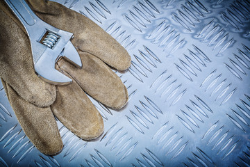 Leather safety gloves adjustable spanner on channeled metal shee