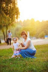 Fototapeta premium Mother and daughter in park