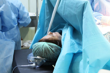 a woman in surgery room at birth