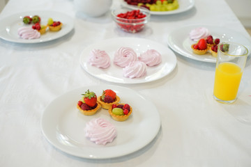 Bowl with berries on the table