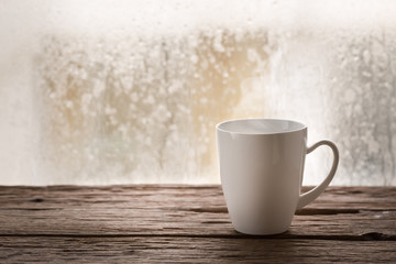 Coffee cup on a rainy