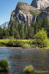 Waterfall and the Merced River  in Yosemite on a Summer's Day
