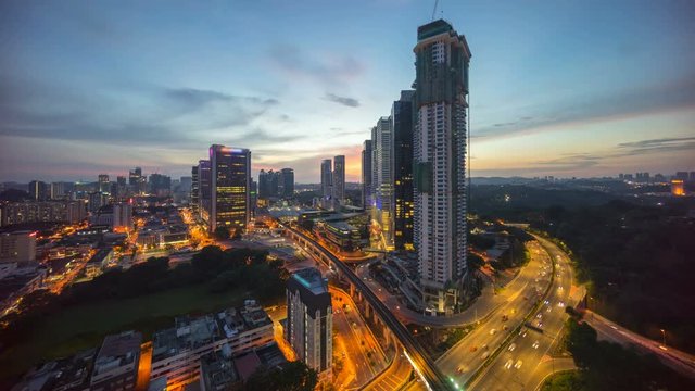 Day to night time lapse of Kuala Lumpur downtown scene.
