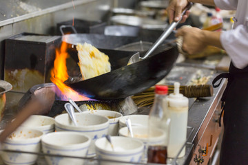 Chef cooking in kitchen