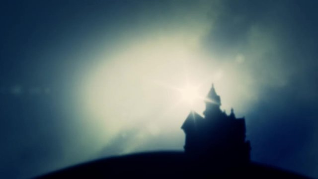 Dark and Grim European castle on a hill in a Foggy Day