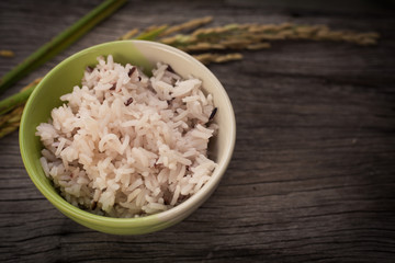 Rice on wooden background
