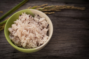 Rice on wooden background
