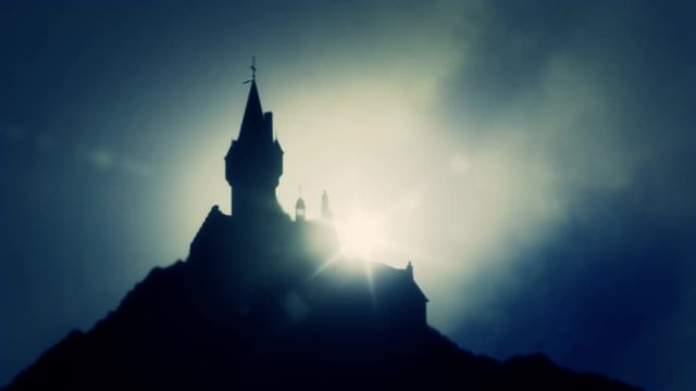 Scary Castle on a top of a Mountain in a Foggy Day