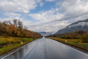 road mountains sky asphalt autumn