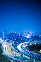 Fototapeta na wymiar Busy highway traffic light trails at night in city of China.