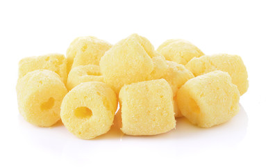 Crunchy corn snacks on a white background