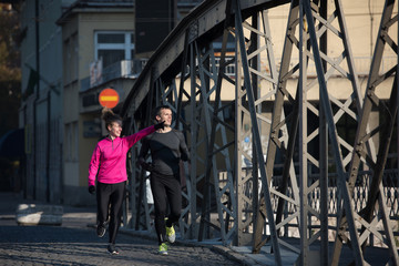 Fototapeta na wymiar young couple jogging
