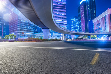 Fototapeta premium Empty asphalt road through modern city in Shanghai,China.