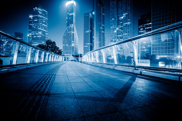 footbridge with cityscape at night in Shanghai,China.