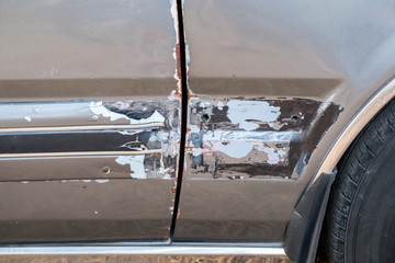Car side is scratched and scraped caused the crash