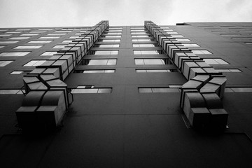 black and white building in the ant eye view with film grain.
