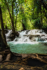 Fototapeta na wymiar Huay Mae Kamin waterfall, the beautiful waterfall in deep forest at Srinakarin Dam National Park - Huay Mae Kamin waterfall. Kanchanaburi, Thailand