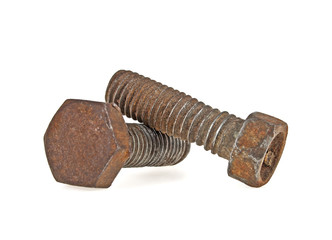 Old rusty iron bolts isolated on white background, selective foc