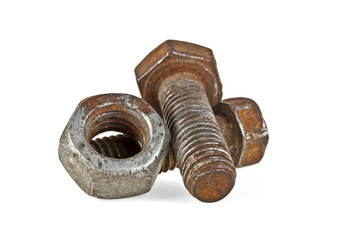 Close-up of rusty nut and bolts isolated on white background