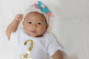 Two month old new born asian cute baby.