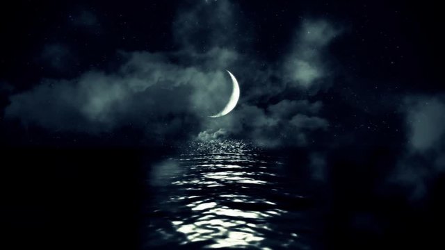 Magical Crescent Moon Above the Sea Reflecting on Water on a Cloudy Starry Night