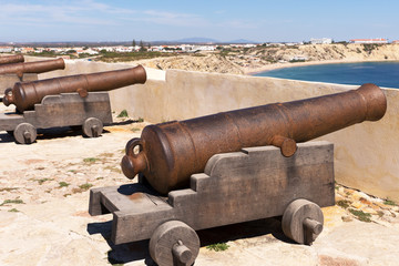 Fototapeta na wymiar Ancient bronze cannons at the fortress of Cabo de Sao Vicente, Sagres, Portugal
