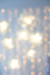 Defocused abstract multicolored bokeh lights background.