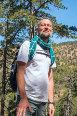 Bearded man on the mountain trail