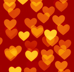 heart bokeh background, photo blurry objects, yellow on brown red