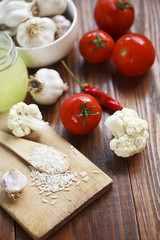 rice and vegetables on a wooden table