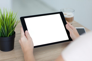 Obraz premium woman holding tablet computer isolated screen on desk in office