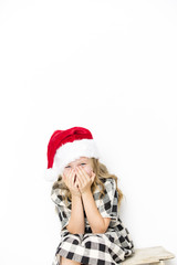 Happy christmas girl in Santa hat on white background
