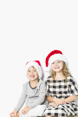 Christmas kids in Santa hat on white background