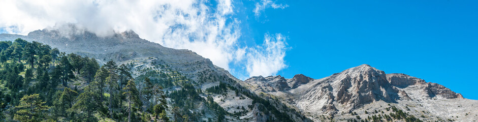 Panoramic view of Mount Olympus peaks from refuge A in summer. - obrazy, fototapety, plakaty