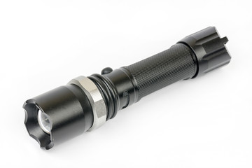 Black police torchlight over white background