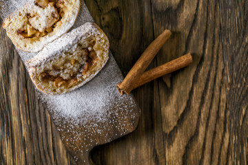 Strudel with apples, nuts and cinnamon.