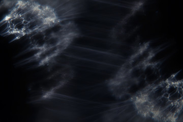 Abstract dark background with glowing white smoky threads. Abstract universe background.