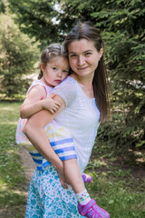  walk mom and daughter in the woods